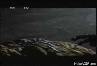 A grainy fast forwarded film still