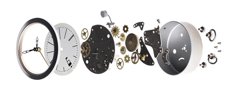 An exploded view of a clock showing its face, gears and casing separated